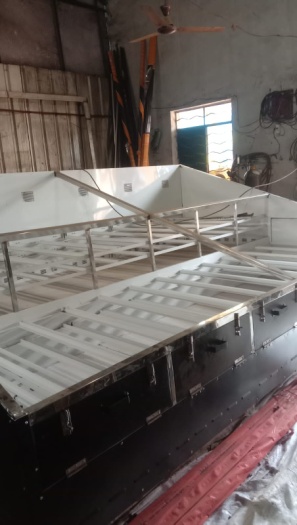 Solar dryer components being loaded for transport at Indore